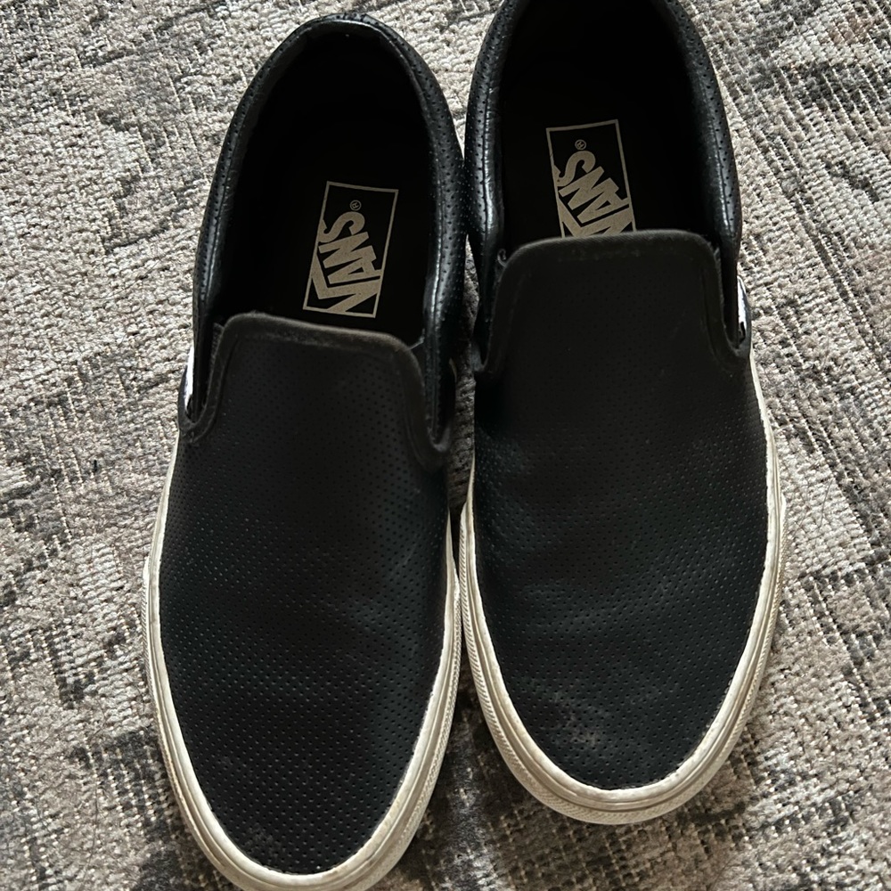 Vans—Perforated Black Slip Ons